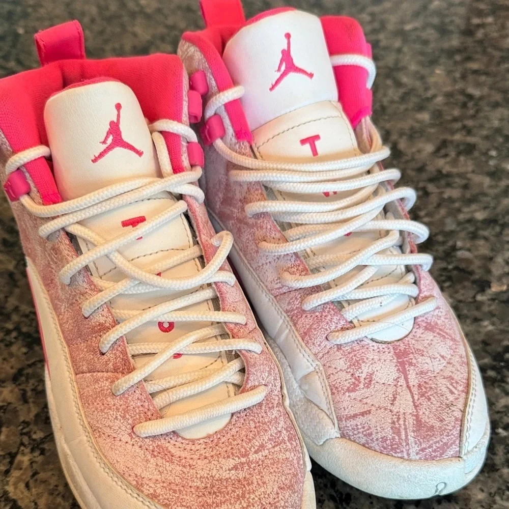 Jordan retro 12 Kids Sneakers in Pink and white 5Y or 7Womens
